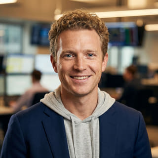 Ryan Brooks, angivet som ledende tradinganalytiker hos Formueskab, vist på et profilbillede